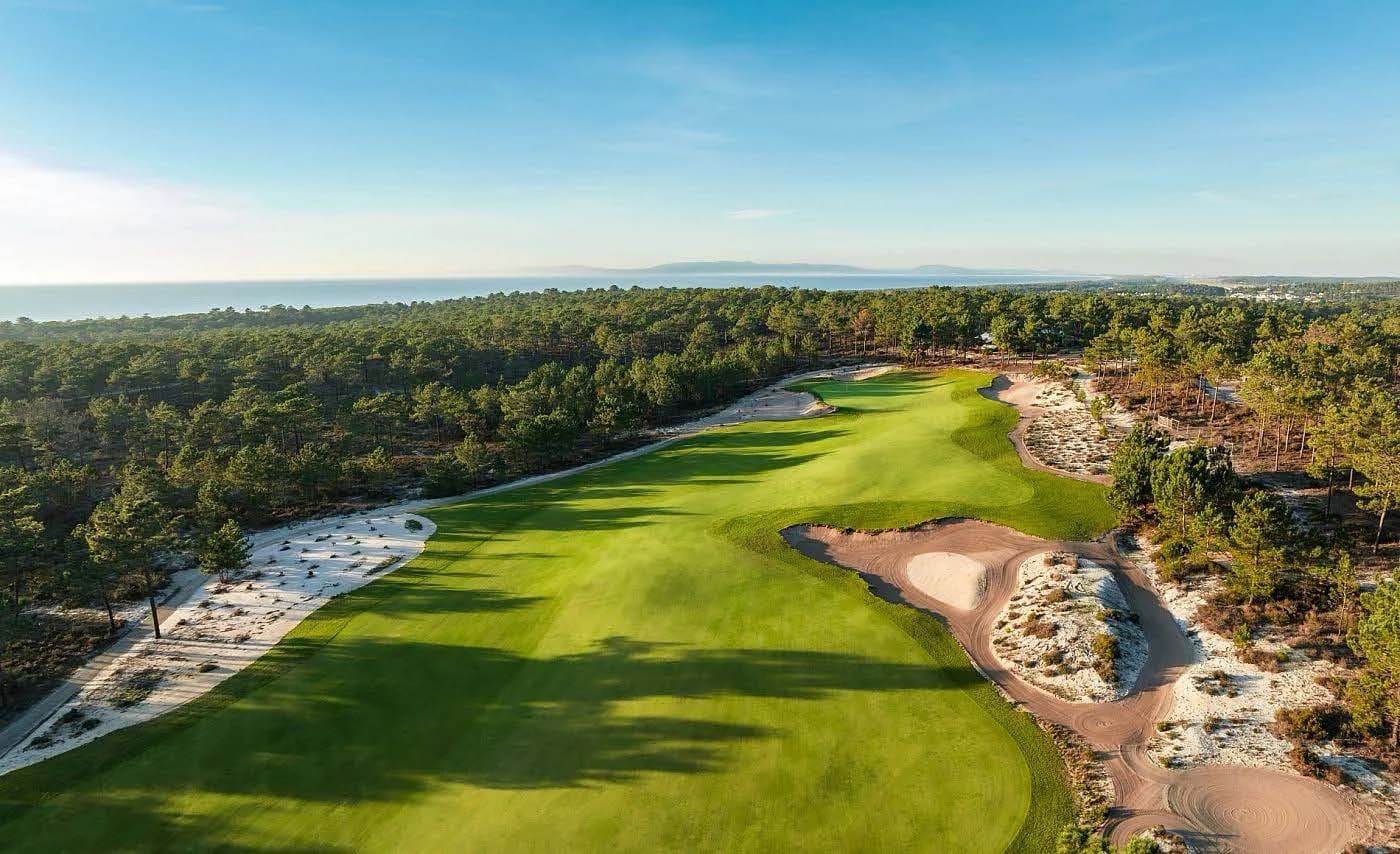Aerial view of a pine-lined fairway on Portugal's Atlantic coast